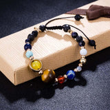 The Galaxy With Pluto Bracelet - Slide It On And You Are The Sun! Just $15.99