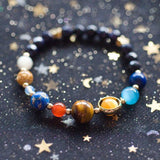 The Galaxy With Pluto Bracelet - Slide It On And You Are The Sun! Just $15.99